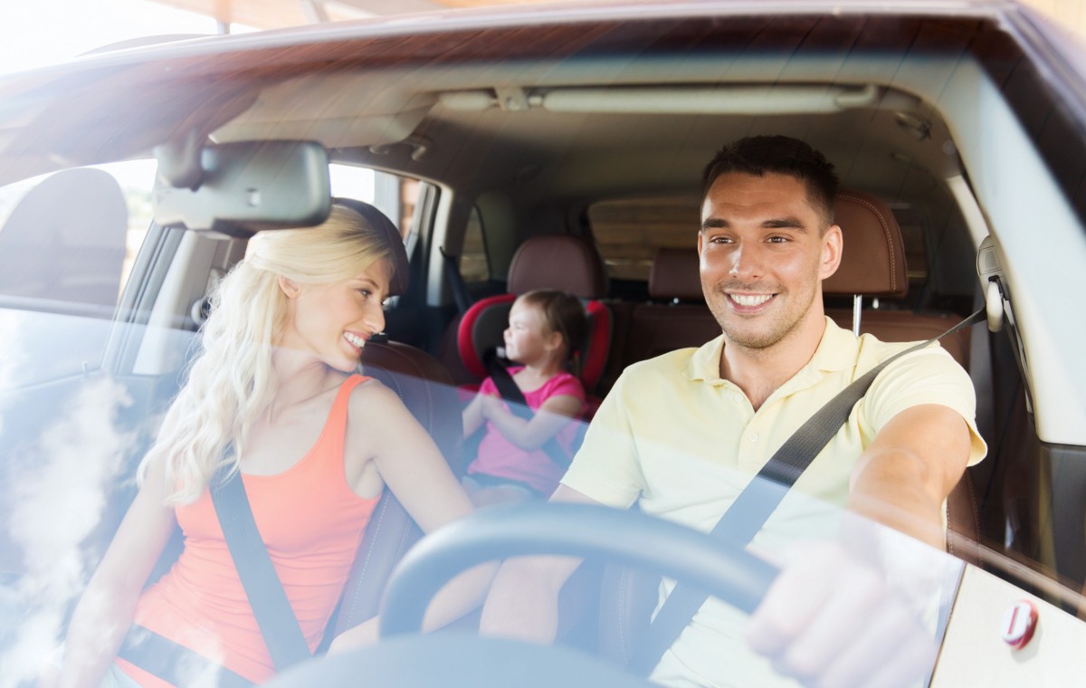 family driving in car